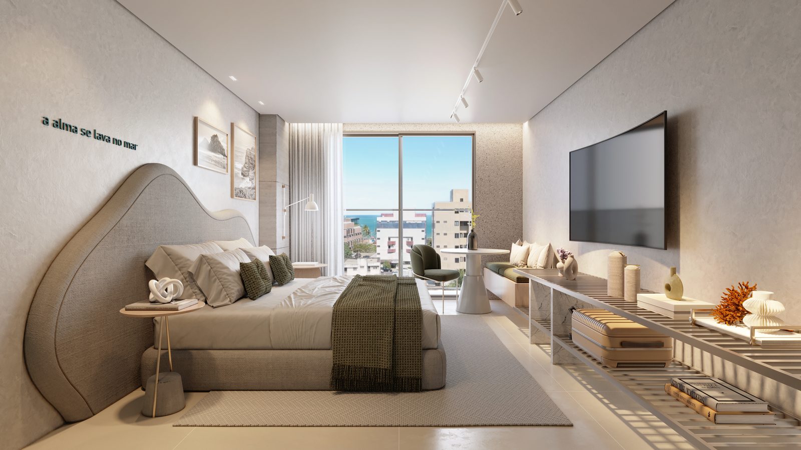 Studio do Lumini com face nascente, cama, estar e vista da orla pela varanda